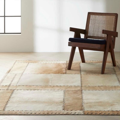 tan pattern area rug