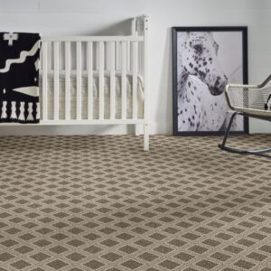 diamond pattern carpet in baby's room
