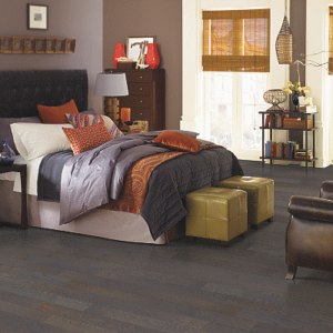 dark brown hardwood floor in bedroom