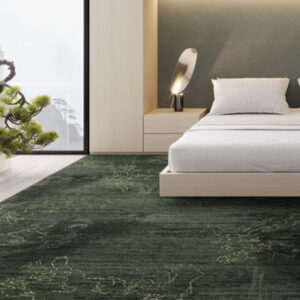 dark green rug with white bed