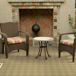 tan diamond pattern outdoor rug with outdoor furniture